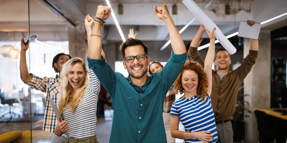 happy employees cheering